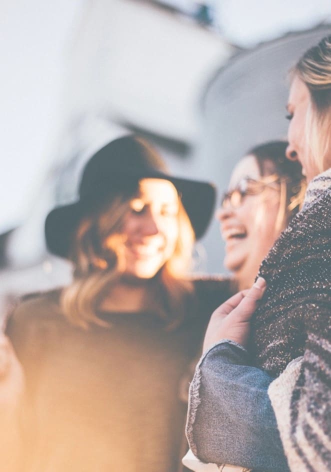 A group of people standing next to each other.